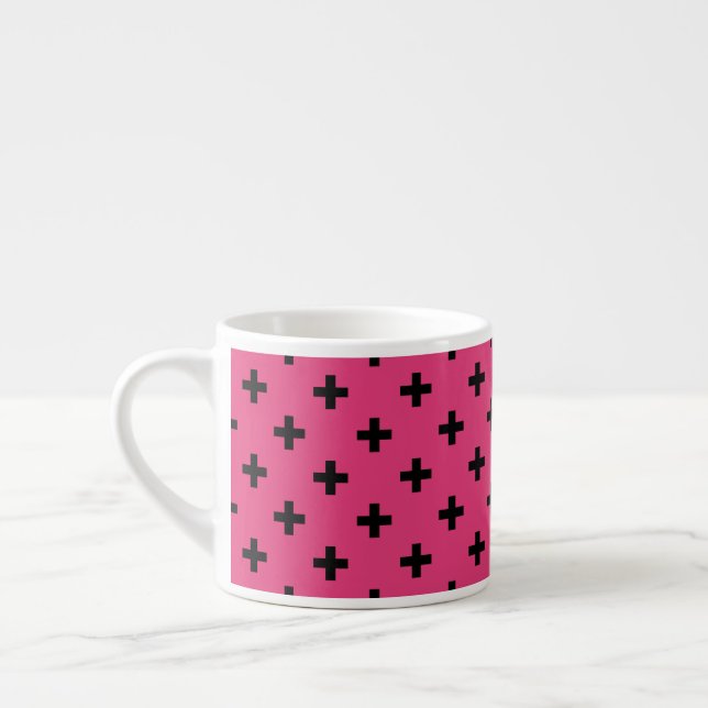 Black polka crosses on fuchsia espresso cup (Left)