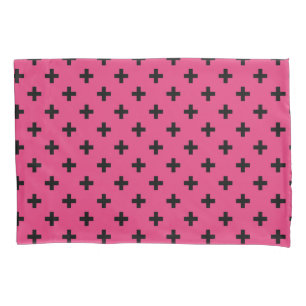 Black polka crosses on fuchsia pillowcase