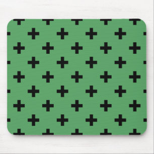 Black polka crosses on green mouse mat