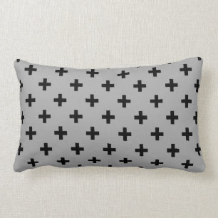 Black polka crosses on grey lumbar cushion