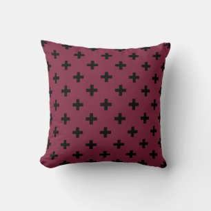 Black polka crosses on mulberry cushion
