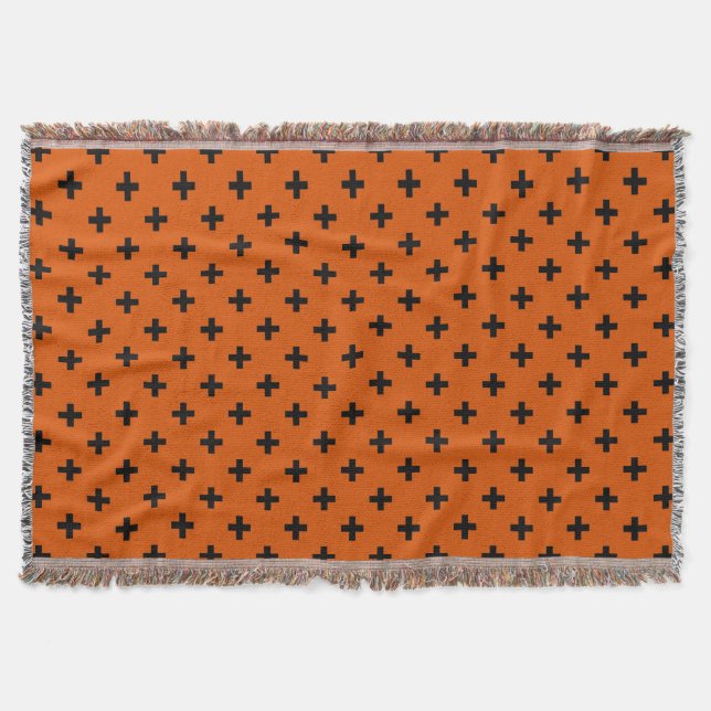 Black polka crosses on orange throw blanket (Front)