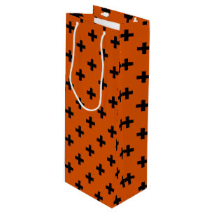Black polka crosses on orange wine gift bag