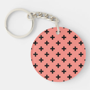 Black polka crosses on peach key ring