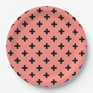 Black polka crosses on peach paper plate