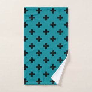 Black polka crosses on teal hand towel