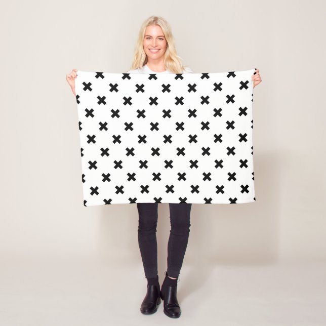 Black polka crosses on white fleece blanket (In Situ)