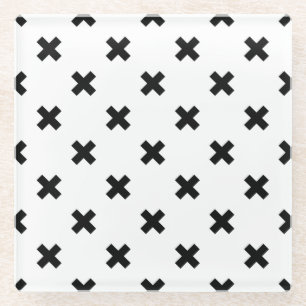 Black polka crosses on white glass coaster