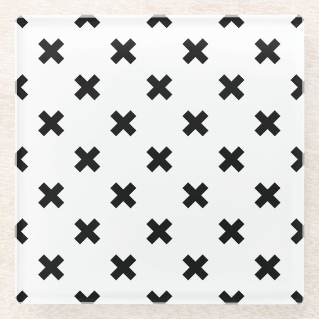Black polka crosses on white glass coaster (Front)