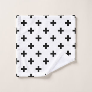 Black polka crosses on white wash cloth