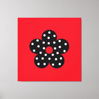 Black Polka Dot Flower on Red Background Canvas Print