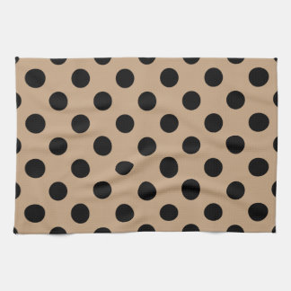 Black polka dots on beige tea towel