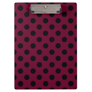 Black polka dots on burgundy clipboard