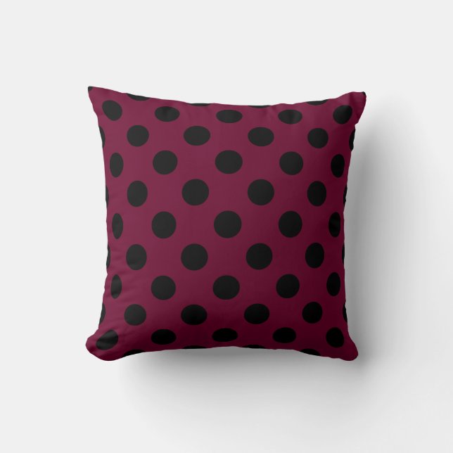 Black polka dots on burgundy cushion (Front)