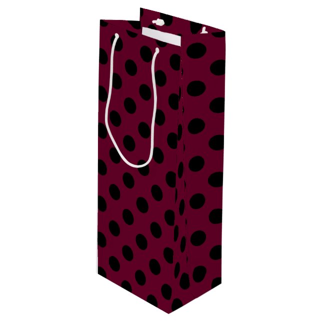 Black polka dots on burgundy wine gift bag (Front Angled)