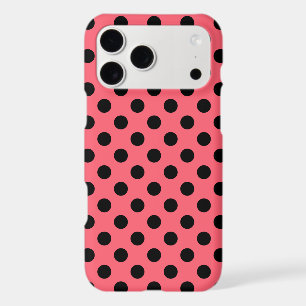 Black polka dots on coral