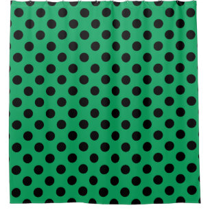 Black polka dots on fresh green shower curtain