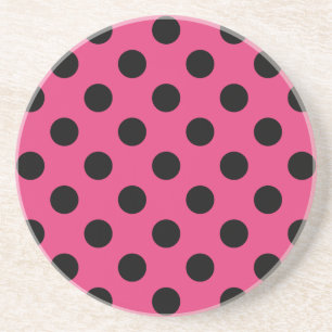 Black polka dots on fuchsia coaster