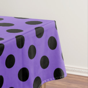 Black polka dots on lavender tablecloth