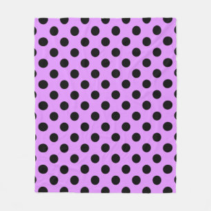 Black polka dots on lilac fleece blanket