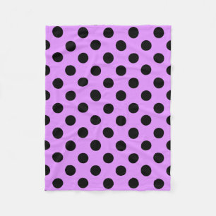 Black polka dots on lilac fleece blanket