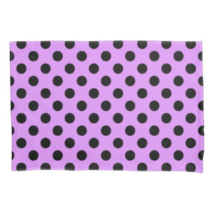 Black polka dots on lilac pillowcase