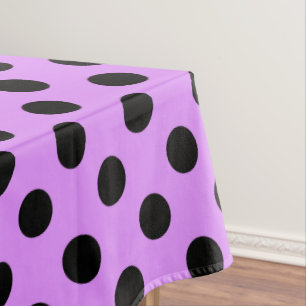 Black polka dots on lilac tablecloth