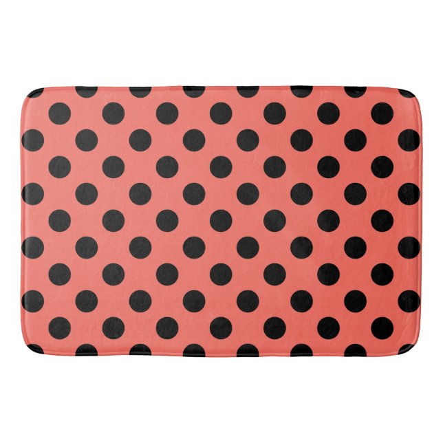 Black polka dots on living coral bath mat (Front)