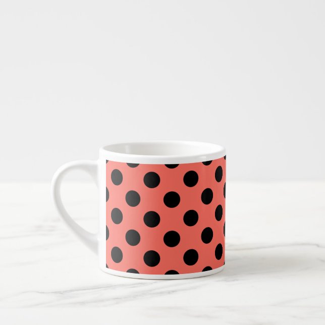 Black polka dots on living coral espresso cup (Left)