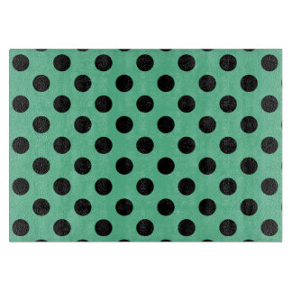 Black polka dots on mint green cutting board