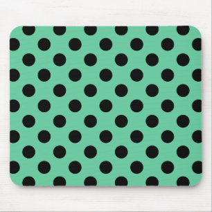 Black polka dots on mint green mouse mat