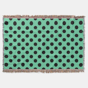 Black polka dots on mint green throw blanket