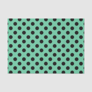 Black polka dots on mint green tissue paper