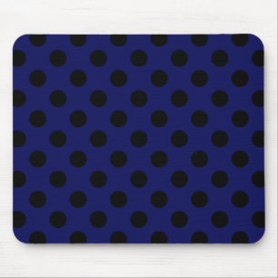 Black polka dots on navy blue mouse mat