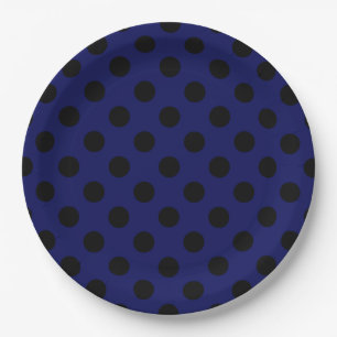 Black polka dots on navy blue paper plate