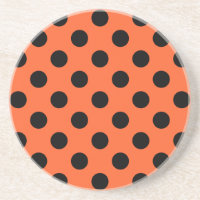 Black polka dots on orange