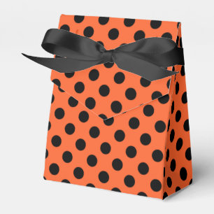Black polka dots on orange favour box