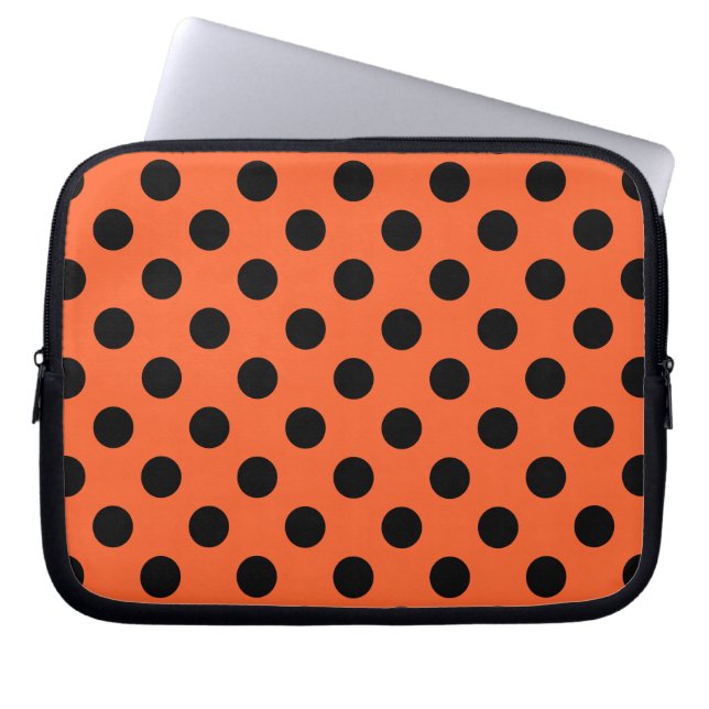 Black polka dots on orange laptop sleeve (Front)