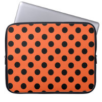 Black polka dots on orange