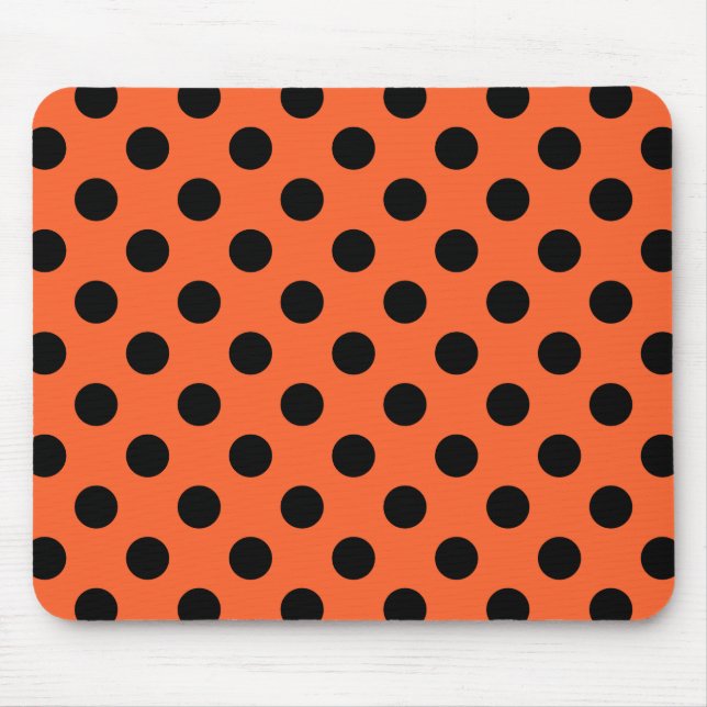 Black polka dots on orange mouse mat (Front)