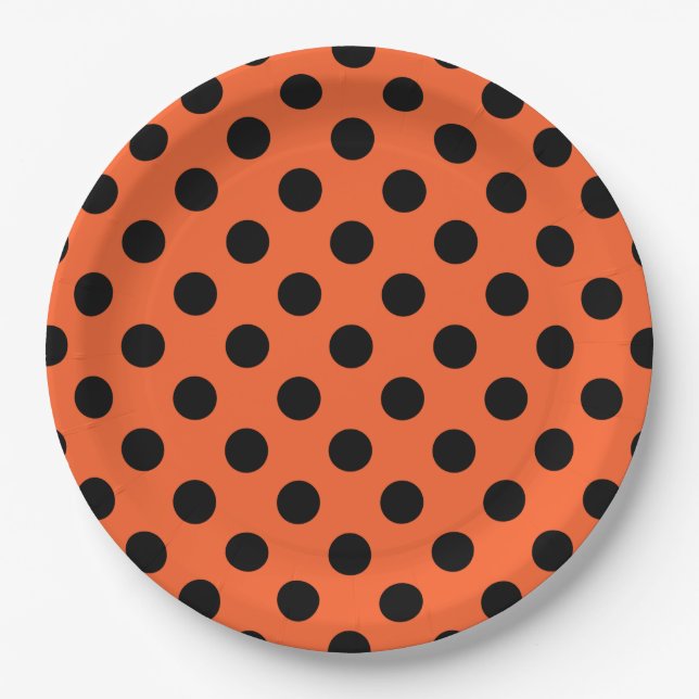 Black polka dots on orange paper plate (Front)