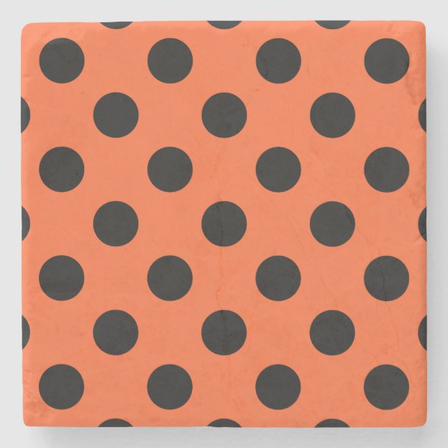 Black polka dots on orange stone coaster (Front)