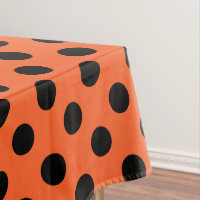 Black polka dots on orange
