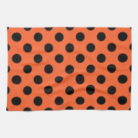 Black polka dots on orange
