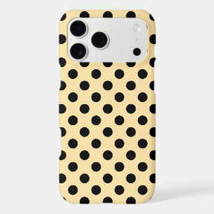 Black polka dots on pale yellow