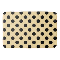 Black polka dots on pale yellow