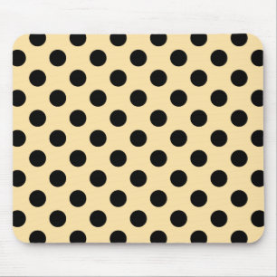 Black polka dots on pale yellow mouse mat