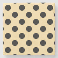 Black polka dots on pale yellow