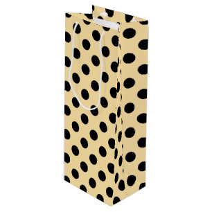 Black polka dots on pale yellow wine gift bag