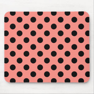 Black polka dots on peach mouse mat